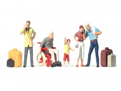 Voyageurs avec bagages et fauteuil roulant