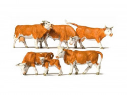Six vaches marrons et blanches
