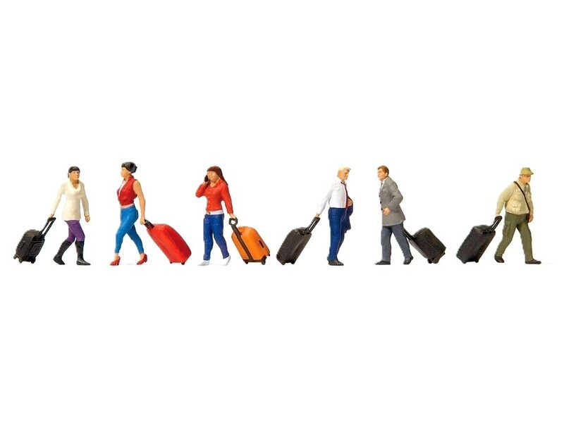 Voyageurs avec valises