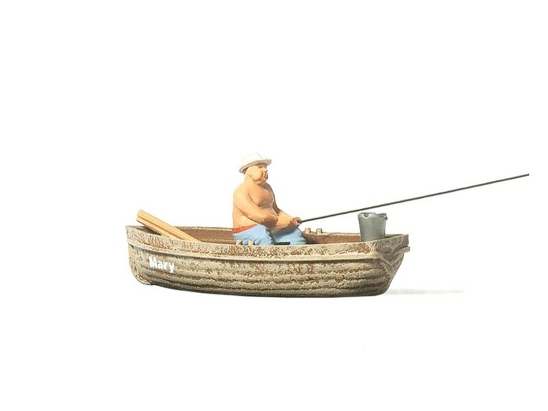 Pêcheur avec barque